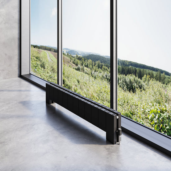 Radiateur design en aluminium dans un intérieur naturel et moderne axé sur le confort durable